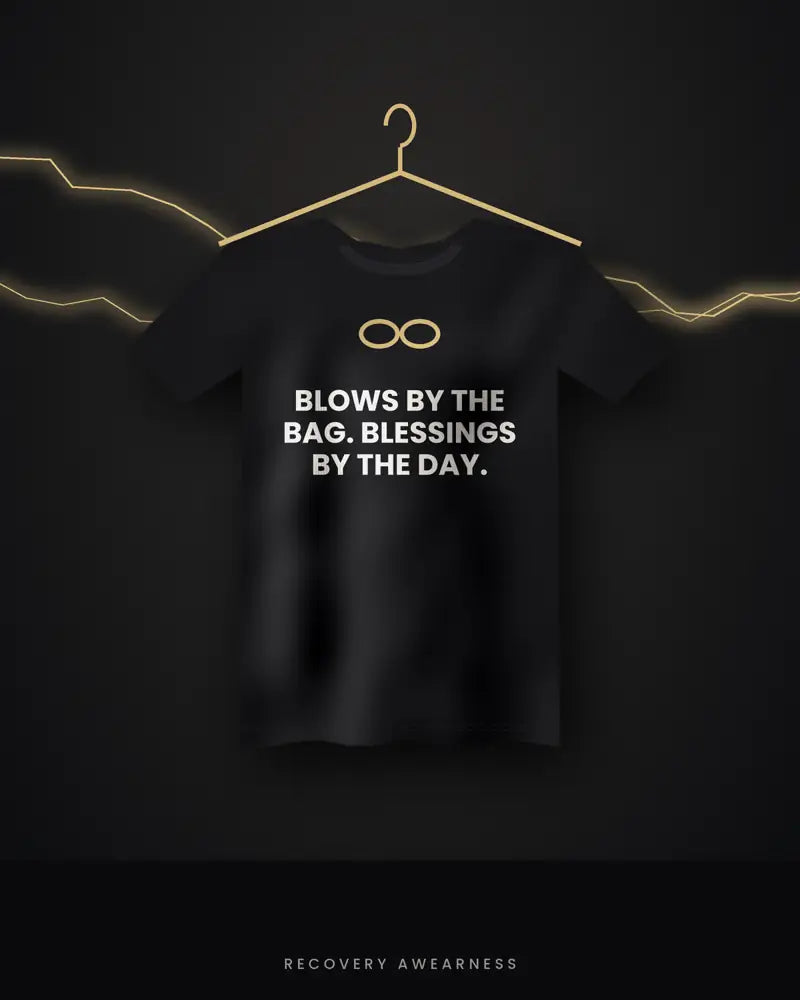 Blows By The Bag. Blessings By The Day. — black tee