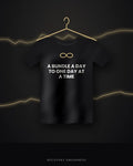 A Bundle A Day To One Day At A Time — black tee