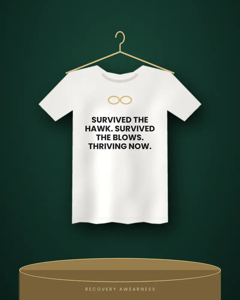 Survived The Hawk. Survived The Blows. Thriving Now. — white tee