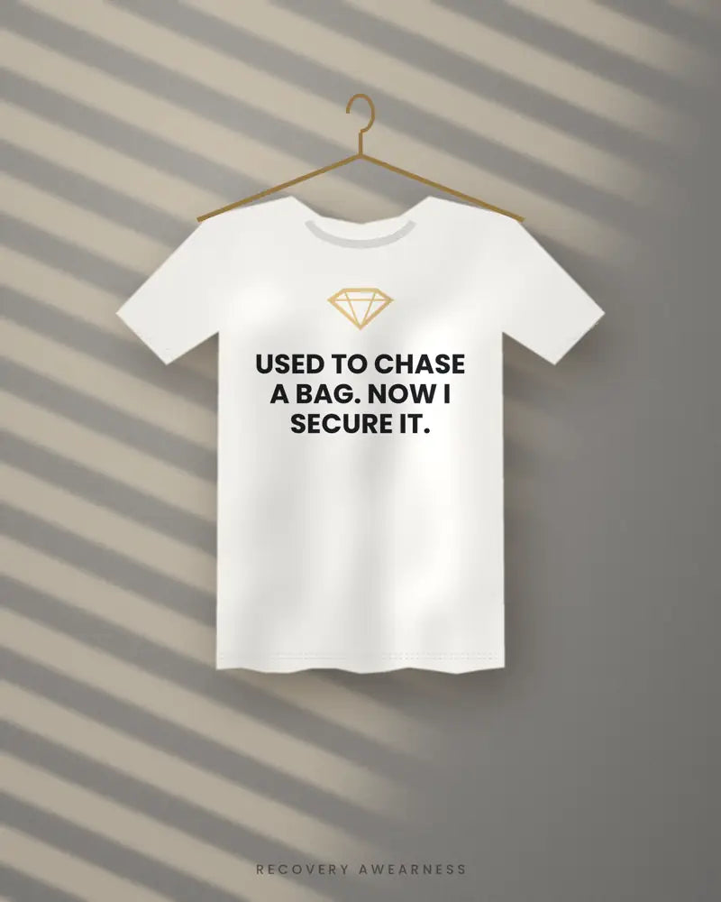 Used To Chase A Bag. Now I Secure It. — white tee