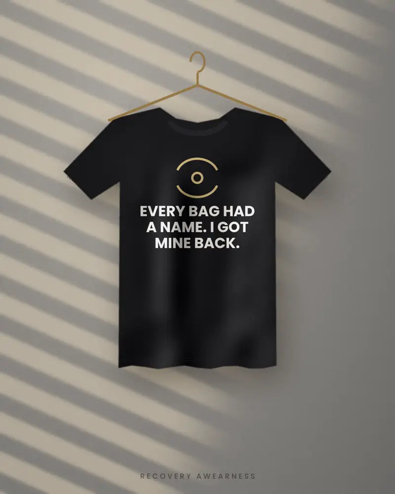 Every Bag Had A Name. I Got Mine Back. — black tee