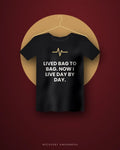 Lived Bag To Bag. Now I Live Day By Day. — black tee