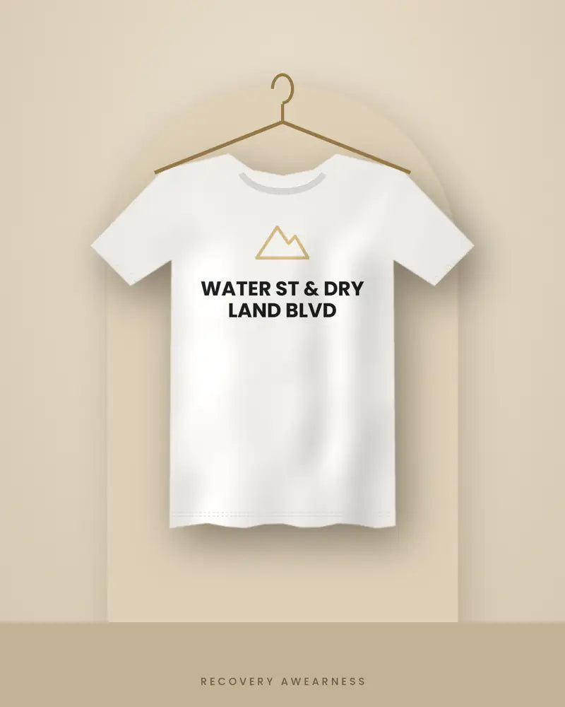 Water St & Dry Land Blvd — white tee