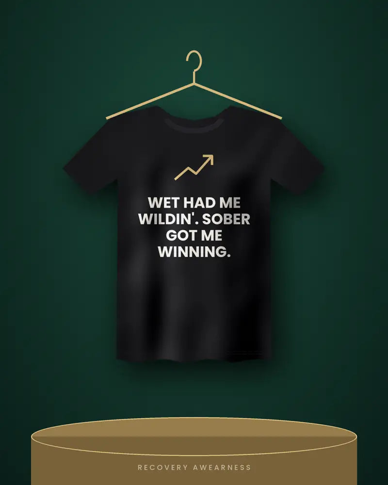 Wet Had Me Wildin'. Sober Got Me Winning. — black tee