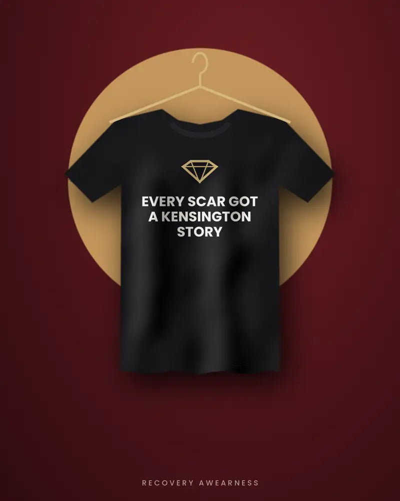 Every Scar Got A Kensington Story — black tee