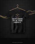 Slept Under The El. Rose Above It. — black tee