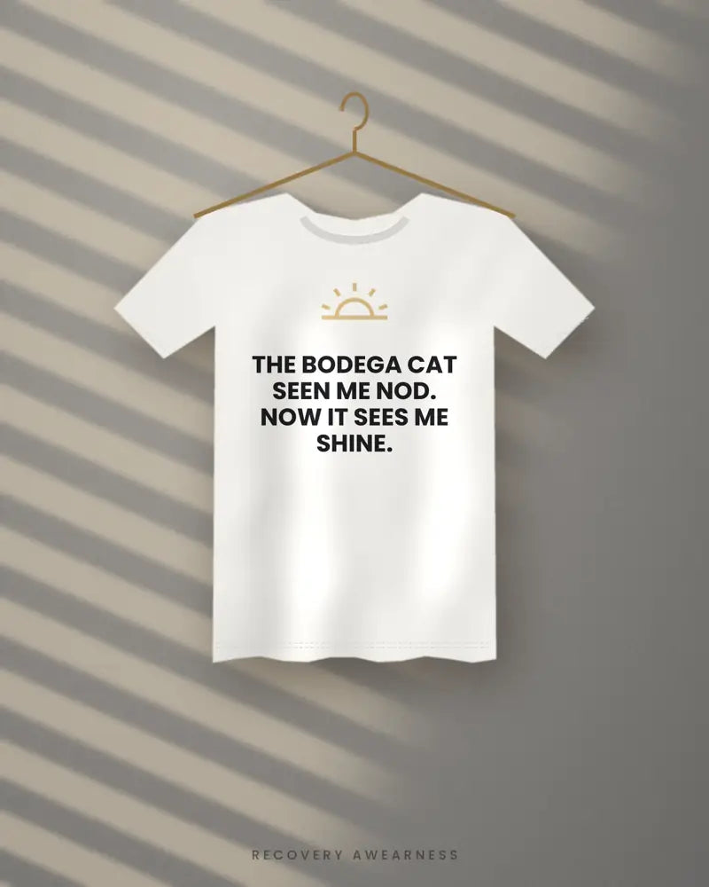 The Bodega Cat Seen Me Nod. Now It Sees Me Shine. — white tee